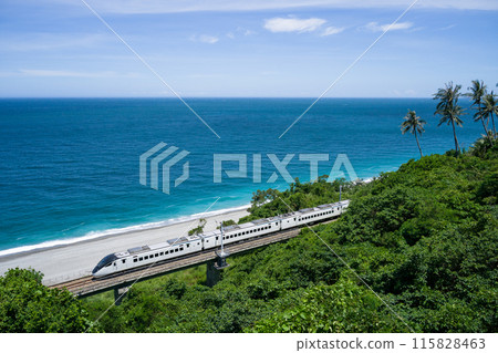 Taiwan Railway Administration EMU3000-type train "Tze-Chiang" runs through Taimali on the South-Link Line with the spectacular sea as a backdrop 115828463