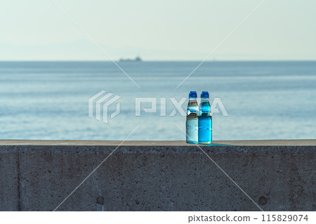 Summer sea sparkling in the morning sun and Ramune Summer sea sparkling in the morning sun and Ramune 115829074