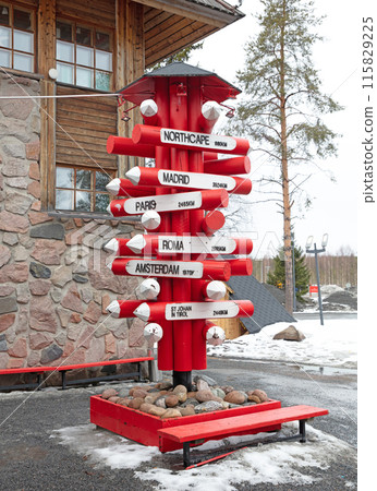 Roadsige pointing to several places all over the world, located in Finland 115829225