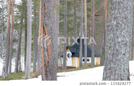 Remote sauna in Finland, next to a frozen lake Remote sauna in Finland, next to a frozen lake 115829277