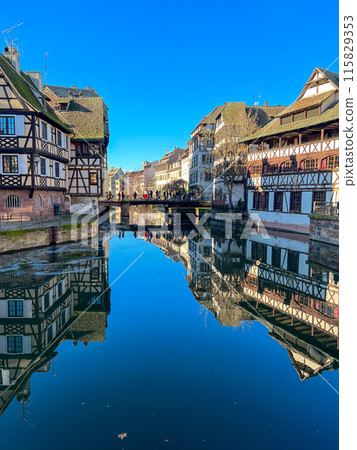 Old half-timbered houses in Strasbourg, France. Strasbourg is the capital and largest city of the Alsace region of France. 115829353