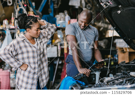 Mechanic man talking with stress worry customer inform explain car problem, service detail hard decision in garage. Mechanic man talking with stress worry customer inform explain car problem, service detail hard decision in garage. 115829706