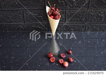 An appetizer with fresh red cherries 115829970