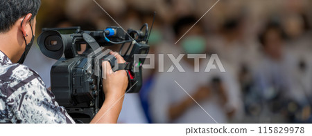 Movie shooting or video production and film crew team with camera equipment. 115829978