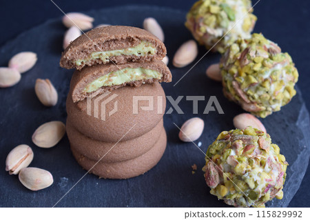 Delicious cookies with chocolate and pistachio Delicious cookies with chocolate and pistachio 115829992