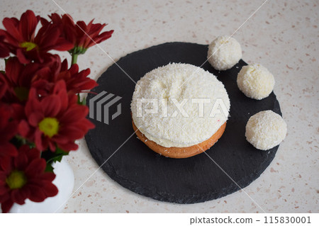 Coconut cake on a black and white background 115830001