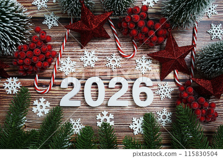 Happy new year 2026 holidays celebration with christmas decorations background 115830504