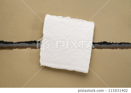 small sheet of blank white Khadi rag paper from India against abstract landscape in earth pastel tones small sheet of blank white Khadi rag paper from India against abstract landscape in earth pastel tones 115831402