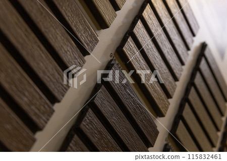 A stand with samples of decorative rails 115832461