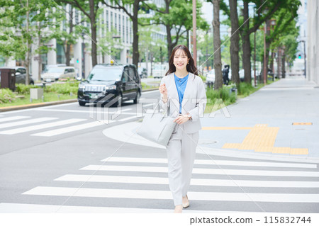 Women walking in the office town Women walking in the office town 115832744