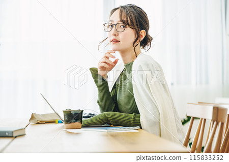 Woman doing telework at home Woman doing telework at home 115833252