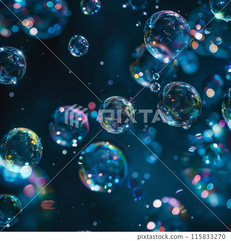 Blue translucent spheres with soapy sheen float in a dark background 115833270
