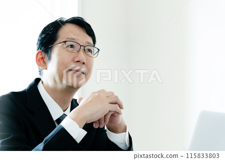 A man in the profession listening to a story A man in the profession listening to a story 115833803