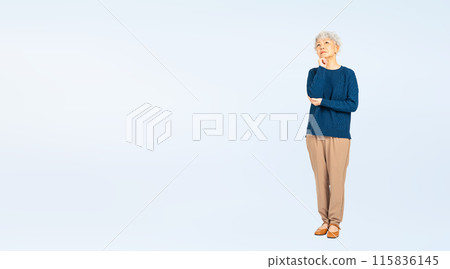 Full body photo of a worried senior woman 115836145