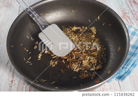A Dirty Frying Pan top view A Dirty Frying Pan top view 115836262