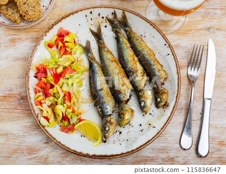 Appetizing fried sardines 115836647