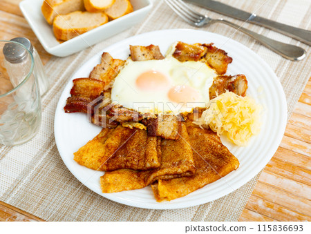 Pancakes with pork ham and fried eggs 115836693