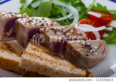 Slices of tuna fillet Tataki 115836823
