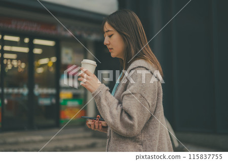 A scene of a 20-something office lady going out during her lunch break A scene of a 20-something office lady going out during her lunch break 115837755