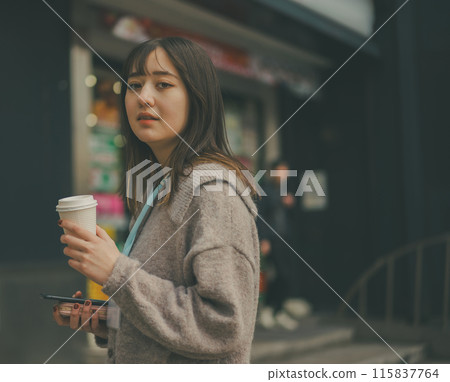 A scene of a 20-something office lady going out during her lunch break 115837764