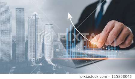 Businessman holding arrow graph corporate future growth plan, Business development to success and growing growth concept, Setting goals for business growth, Business marketing success. Businessman holding arrow graph corporate future growth plan, Business development to success and growing growth concept, Setting goals for business growth, Business marketing success. 115838045