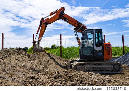 Soil receiving yard Heavy equipment backhoe 115838748