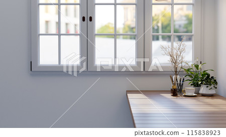 A side view image of a wooden table with decorative plants by the window in a minimalist white room. 115838923