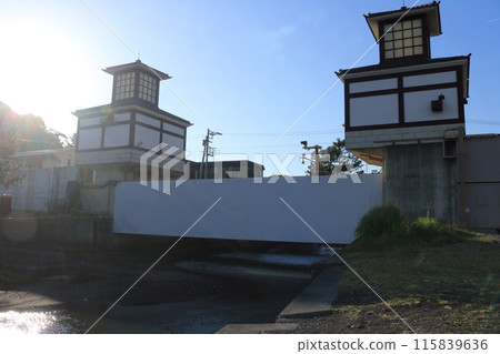 Blue sky, Numazu canal, water gate and river flowing into the sea Blue sky, Numazu canal, water gate and river flowing into the sea 115839636