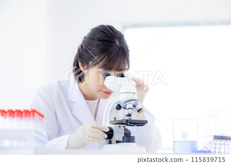 Research image: A woman working in a laboratory 115839715