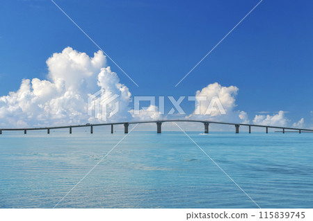 Irabu Bridge spanning the blue sea and cumulonimbus clouds 115839745