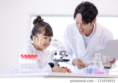 Elementary school girl and teacher studying science Elementary school girl and teacher studying science 115839853