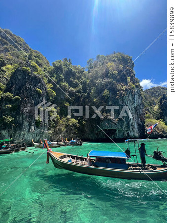 Phi Phi Islands: Clear turquoise waters and small boats 115839899