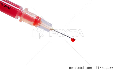 1 ml syringe filled with fake blood and a drop on needle isolated on white background 115840236
