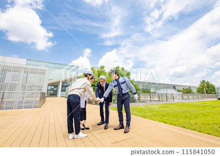 Image of teamwork among people of various professions (businessmen, engineers, researchers, security guards) Image of teamwork among people of various professions (businessmen, engineers, researchers, security guards) 115841050