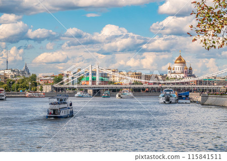 Cruise ship sails on the Moscow river in Moscow city center, popular place for walking. 115841511