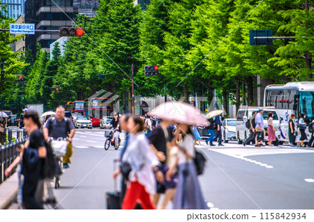 Tokyo cityscape in Japan Inbound tourism is back...Popular Tokyo sightseeing...Tokyo Station is bustling with tourists. Crossing the street... Tokyo cityscape in Japan Inbound tourism is back...Popular Tokyo sightseeing...Tokyo Station is bustling with tourists. Crossing the street... 115842934