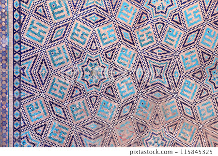 Vertical or horizontal background with detail of ancient mosaic walls with clay details and geometric ceramic tile ornament. Traditional iranian tile decorations Vertical or horizontal background with detail of ancient mosaic walls with clay details and geometric ceramic tile ornament. Traditional iranian tile decorations 115845325