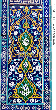 Vertical background with detail of ancient mosaic walls with floral and geometric ornament. Traditional tile decoration on wall, Samarkand, Uzbekistan 115845332