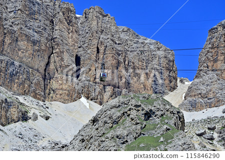 The Sassopordoi Ropeway ascends the cliffs of the Sella Massif The Sassopordoi Ropeway ascends the cliffs of the Sella Massif 115846290
