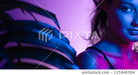 Mysterious Half-Face Portrait Of Woman In Neon Light Mysterious Half-Face Portrait Of Woman In Neon Light 115846304