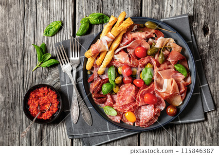 italian antipasto plate of cured meat and veggies italian antipasto plate of cured meat and veggies 115846387