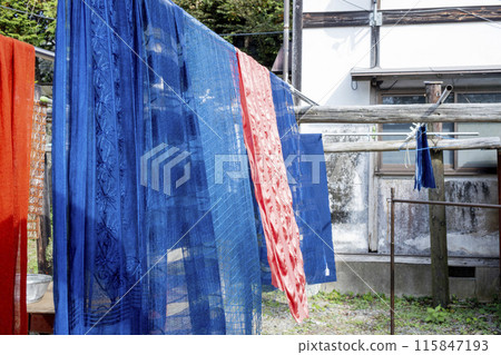 Indigo-dyed cloth drying at the Higeta Indigo Dyeing Workshop Indigo-dyed cloth drying at the Higeta Indigo Dyeing Workshop 115847193