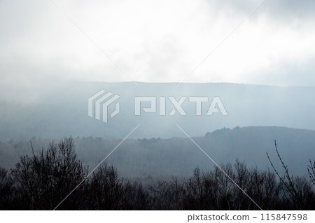 Bad weather in the mountains 115847598
