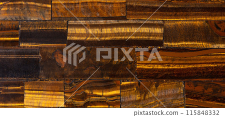 Tigers Eye Golden stone background, texture in expensive color. Tigers Eye Golden stone background, texture in expensive color. 115848332