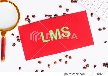LMS- Learning Management System written on a red card on a white background in a composition with coffee beans and a magnifying glass LMS- Learning Management System written on a red card on a white background in a composition with coffee beans and a magnifying glass 115848655