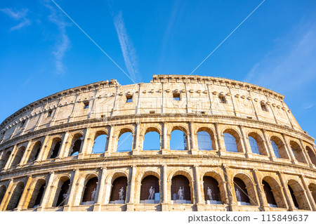 Close-up of the iconic Roman Colosseum with arches and weathered stone facade, capturing the grandeur of this historic amphitheater. Rome, Italy Close-up of the iconic Roman Colosseum with arches and weathered stone facade, capturing the grandeur of this historic amphitheater. Rome, Italy 115849637