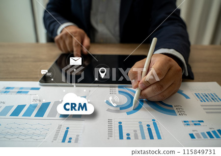 crm analyst uses a computer and dashboard Customer Relationship Management 115849731