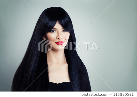 Brunette young model woman with long healthy dark straight smooth hair and make-up 115850581