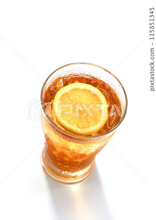 Ice lemon tea poured into a glass 115851345