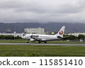 Passenger plane, airplane, J-AIR Embraer 170 landing at Osaka Airport and Itami Airport in the rain 115851410
